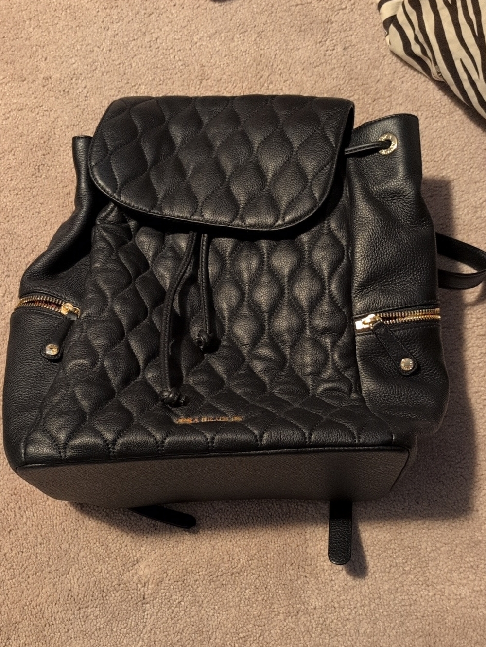 Vera Bradley Quilted Black Drawstring Amy Backpack with Gold Accents